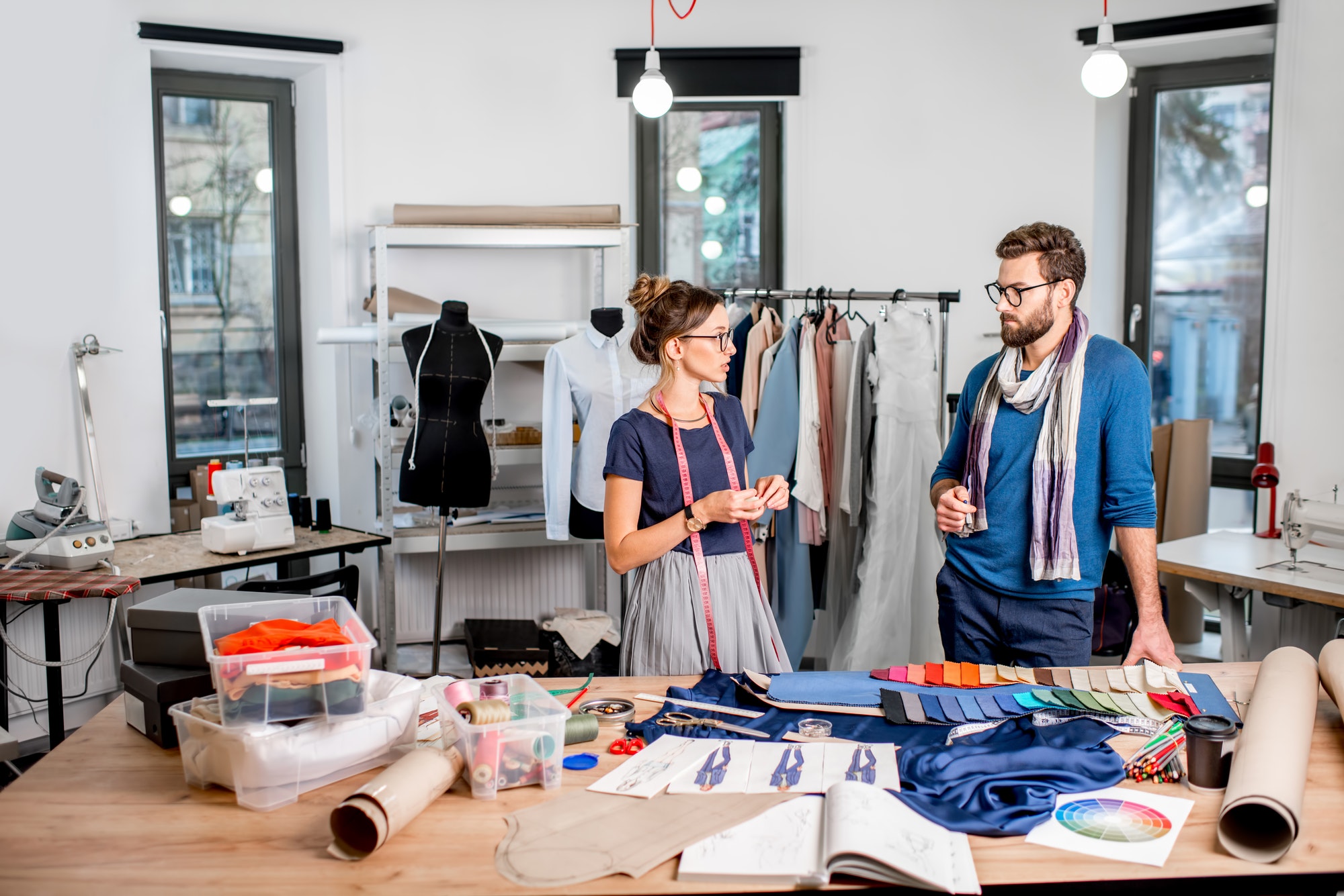 couple-of-fashion-designers-working-at-the-studio-2