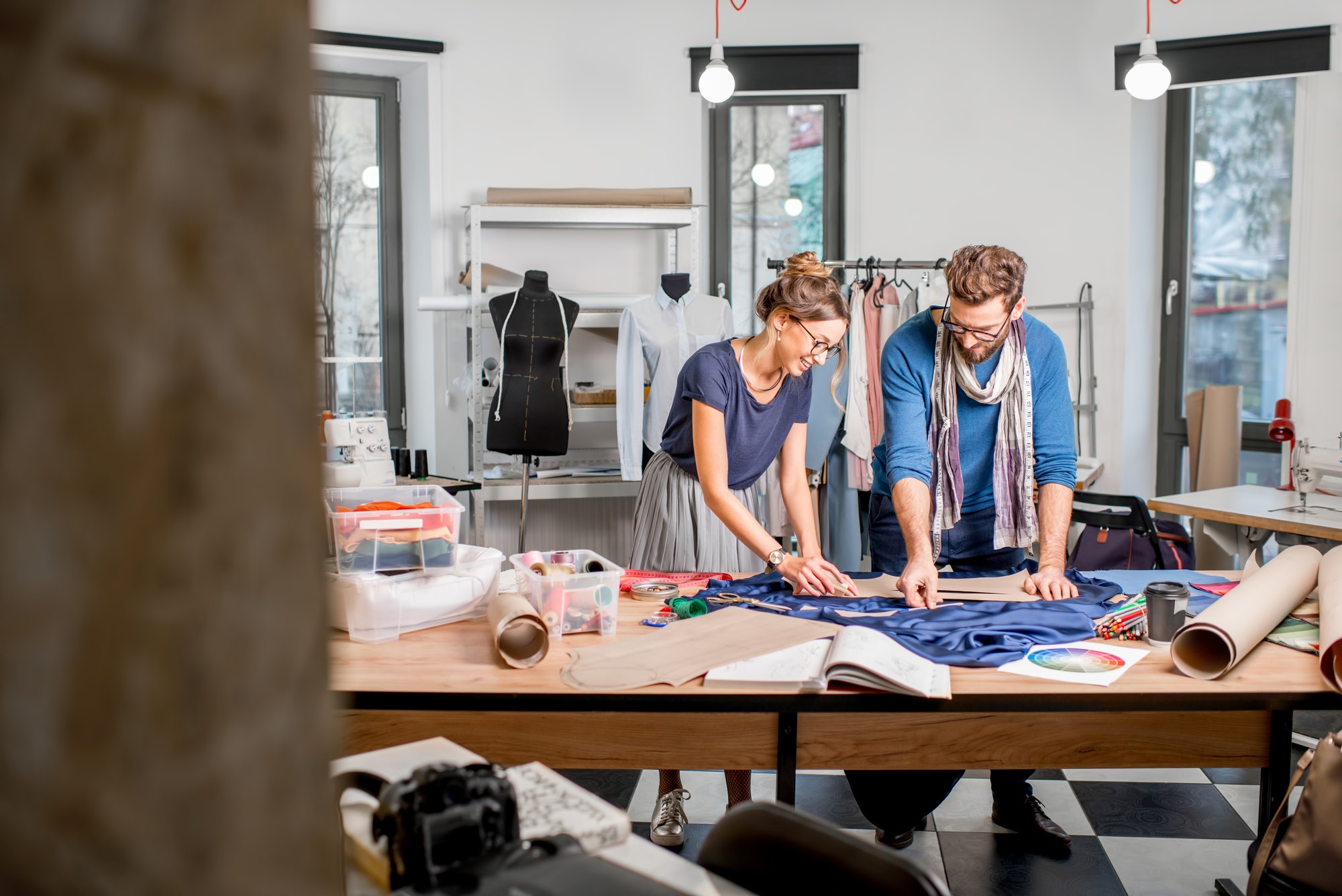 couple-of-fashion-designers-working-at-the-studio-3